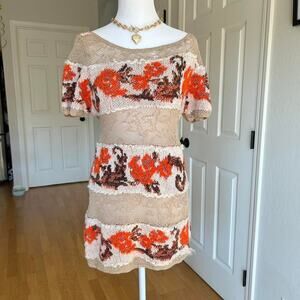 Orange and cream knitted floral Knitted & Knotted dress (Anthropologie)